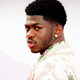 Image for article titled Following the Satan Shoes Controversy, Lil Nas X Calls Out the Hypocrisy in Another Blood-Filled Drop